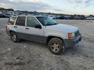 ✅ 1996 Jeep Grand Cherokee Laredo • VIN: 1J4GZ58S9TC197092 • Лот: 87362065. Опубликован ранее на Copart с пробегом 243 983 миль. Бесплатный доступ к архиву аукционных продаж из США и подробный отчёт об истории автомобиля на DreamBid. Изображение 4.