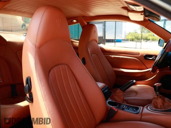 ✅ 2005 Maserati Coupe • VIN: ZAMBC38AX50016XXX • Lot: 71891615. Wystawiony na Copart z przebiegiem 40 333 mil. Bezpłatny archiwum sprzedaży aukcyjnych z USA i szczegółowy raport historii pojazdu na DreamBid. Zdjęcie 5.