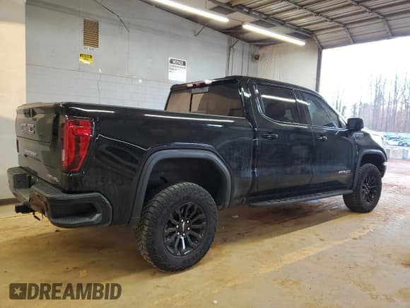 ✅ 2023 GMC Sierra 1500 AT4X • VIN: 3GTUUFELXPG203818 • Лот: 42759075. Опубликован ранее на Copart с пробегом 55 865 миль. Бесплатный доступ к архиву аукционных продаж из США и подробный отчёт об истории автомобиля на DreamBid. Изображение 3.
