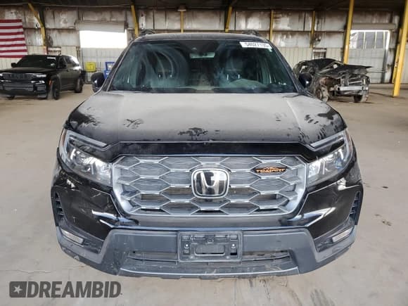 ✅ 2023 Honda Passport TrailSport • VIN: 5FNYF8H63PB008839 • Lot: 54027135. Wystawiony na Copart z przebiegiem 27 359 mil. Bezpłatny archiwum sprzedaży aukcyjnych z USA i szczegółowy raport historii pojazdu na DreamBid. Zdjęcie 5.