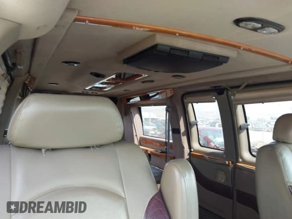 ✅ 2004 Chevrolet Express Passenger • VIN: 1GBFG15T441149305 • Lot: 43040447. Listed on IAAI with 169,635 mi. Free auction sales archive from the USA and detailed vehicle history report at DreamBid. Image 13.