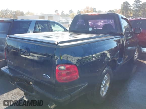 ✅ 2003 Ford F-150 XL • VIN: 2FTRF07W03CA16342 • Lot: 43635870. Listed on IAAI with Not provided. Free auction sales archive from the USA and detailed vehicle history report at DreamBid. Image 4.
