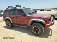 ✅ 1999 Jeep Cherokee Sport • VIN: 1J4FT68S5XL675839 • Lot: 65230005. Listed on Copart with 204,102 mi. Free auction sales archive from the USA and detailed vehicle history report at DreamBid. Image 4.