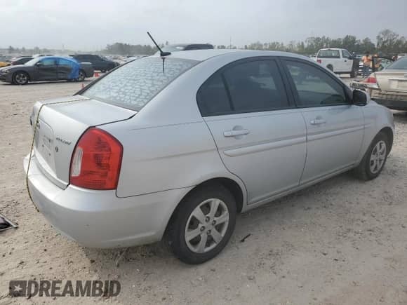 2010 Hyundai Accent GLS z VIN KMHCN4AC6AU500703, wystawiony jako Copart lot #82541114 z przebiegiem 188 357 mil mil oraz Szkoda całkowita • Salvage title. Historia ofert i sprzedaży dostępna na DreamBid. Obrazek 3.