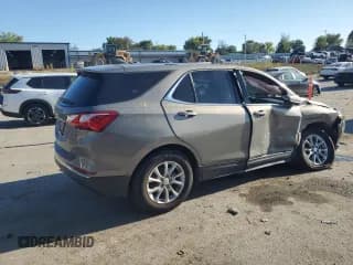 ✅ 2018 Chevrolet Equinox LT • VIN: 3GNAXJEV0JS627342 • Lot: 85385845. Wystawiony na Copart z przebiegiem 59 851 mil. Bezpłatny archiwum sprzedaży aukcyjnych z USA i szczegółowy raport historii pojazdu na DreamBid. Zdjęcie 3.
