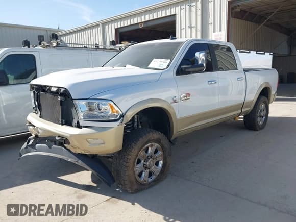 ✅ 2014 Ram 2500 Longhorn • VIN: 3C6UR5GLXEG244401 • Lot: 41779709. Listed on IAAI with 180,760 mi. Free auction sales archive from the USA and detailed vehicle history report at DreamBid. Image 2.