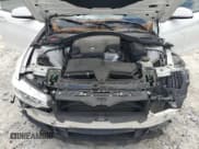 ✅ 2015 BMW 4 Series 428i • VIN: WBA4A5C57FG052581 • Lot: 84033205. Listed on Copart with 76,638 mi. Free auction sales archive from the USA and detailed vehicle history report at DreamBid. Image 11.