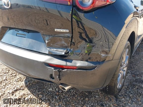 ✅ 2025 Mazda CX-30 S Preferred • VIN: 3MVDMBCM8SM812080 • Lot: 43064504. Listed on IAAI with 7,313 mi. Free auction sales archive from the USA and detailed vehicle history report at DreamBid. Image 6.