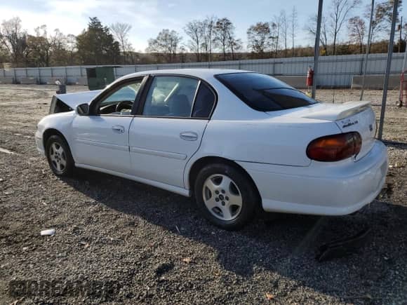 2003 Chevrolet Malibu LS with VIN 1G1NE52J73M591038, listed as a Copart auction lot 83306644 with 190,886 mi miles and Salvage title. Bid and sale history available at DreamBid. Image 2.
