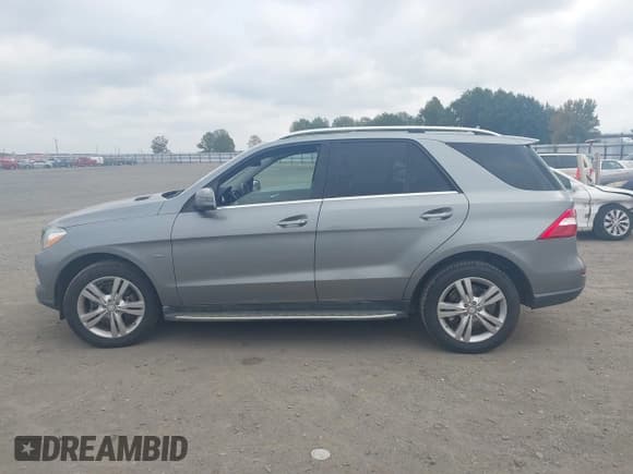 ✅ 2012 Mercedes-Benz M 350 • VIN: 4JGDA5HB2CA010119 • Lot: 43638334. Listed on IAAI with 87,189 mi. Free auction sales archive from the USA and detailed vehicle history report at DreamBid. Image 14.