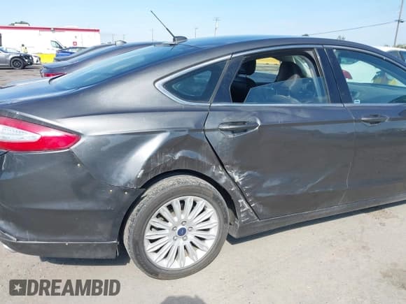✅ 2015 Ford Fusion SE Hybrid • VIN: 3FA6P0LU4FR170591 • Лот: 43075099. Опубликован ранее на IAAI с пробегом 187 685 миль. Бесплатный доступ к архиву аукционных продаж из США и подробный отчёт об истории автомобиля на DreamBid. Изображение 6.