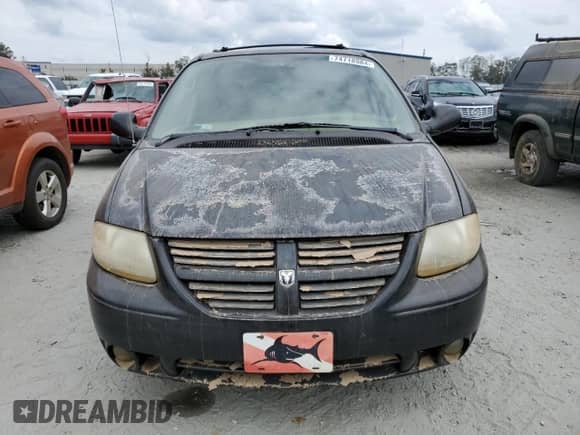 2005 Dodge Caravan SXT z VIN 2D4GP44LX5R544415, wystawiony jako Copart lot #74718984 z przebiegiem Nie podano mil oraz Szkoda całkowita • Salvage title. Historia ofert i sprzedaży dostępna na DreamBid. Obrazek 5.