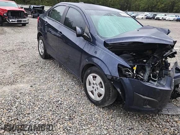 ✅ 2016 Chevrolet Sonic LS • VIN: 1G1JA5SH9G4148211 • Lot: 82619965. Listed on Copart with 84,000 mi. Free auction sales archive from the USA and detailed vehicle history report at DreamBid. Image 13.