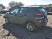 ✅ 2021 Hyundai Kona SE • VIN: KM8K1CAA1MU656295 • Лот: 72766764. Опубликован ранее на Copart с пробегом 79 150 миль. Бесплатный доступ к архиву аукционных продаж из США и подробный отчёт об истории автомобиля на DreamBid. Изображение 2.