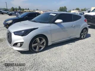 2013 Hyundai Veloster Turbo с VIN KMHTC6AE4DU158062, выставлен на аукционе Copart как лот 60075385 с пробегом 114 083 миль миль и Списание • Salvage title. История ставок и продаж доступна на DreamBid. Изображение 1.