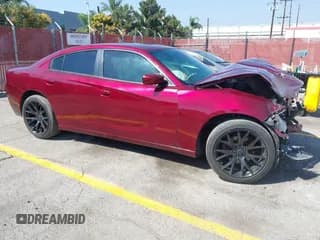 ✅ 2020 Dodge Charger SXT • VIN: 2C3CDXBGXLH136791 • Lot: 43348347. Listed on IAAI with 74,564 mi. Free auction sales archive from the USA and detailed vehicle history report at DreamBid. Image 1.