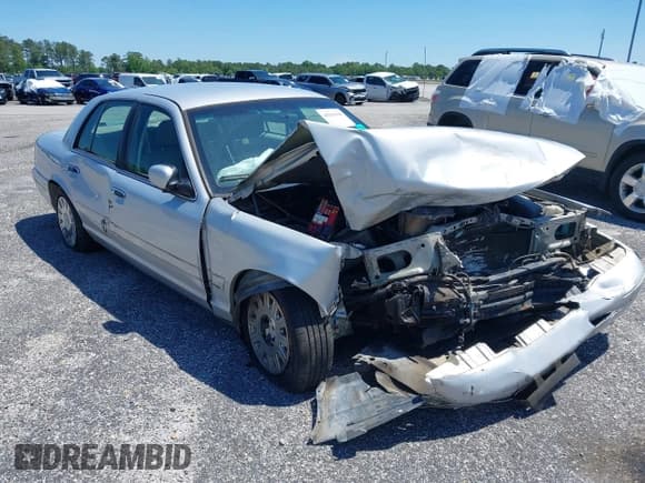 ✅ 2003 Ford Police Interceptor Street Appear • VIN: 2FAFP71W93X101292 • Lot: 40263949. Listed on IAAI with 255,111 mi. Free auction sales archive from the USA and detailed vehicle history report at DreamBid. Image 6.