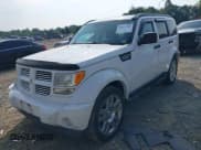 ✅ 2011 Dodge Nitro Heat • VIN: 1D4PU4GX0BW564036 • Lot: 42855542. Listed on IAAI with 156,845 mi. Free auction sales archive from the USA and detailed vehicle history report at DreamBid. Image 2.