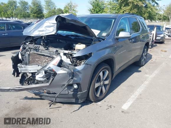 2021 Chevrolet Traverse LT with VIN 1GNEVHKW0MJ150947, listed as a IAAI auction lot 43146060 with 87,182 mi miles and . Bid and sale history available at DreamBid. Image 17.