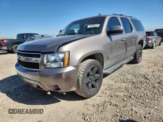 2013 Chevrolet Suburban LT with VIN 1GNSKJE79DR335667, listed as a Copart auction lot 85008435 with 223,366 mi miles and Clean title. Bid and sale history available at DreamBid. Image 1.