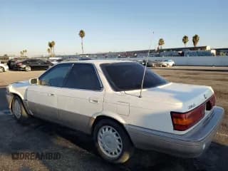 ✅ 1990 Lexus ES • VIN: JT8VV22T5L0096463 • Лот: 70032254. Опубликован ранее на Copart с пробегом 127 414 миль. Бесплатный доступ к архиву аукционных продаж из США и подробный отчёт об истории автомобиля на DreamBid. Изображение 2.