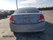 ✅ 2012 Scion tC • VIN: JTKJF5C7XC3035696 • Лот: 82638675. Опубликован ранее на Copart с пробегом 93 537 миль. Бесплатный доступ к архиву аукционных продаж из США и подробный отчёт об истории автомобиля на DreamBid. Изображение 6.