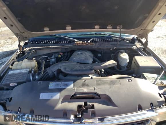 2004 Chevrolet Suburban LS с VIN 1GNFK16TX4J296924, выставлен на аукционе Copart как лот 77017754 с пробегом 281 408 миль миль и На запчасти • Non repairable. История ставок и продаж доступна на DreamBid. Изображение 7.