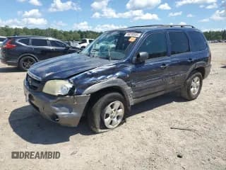 ✅ 2003 Mazda Tribute LX • VIN: 4F2YZ04163KM43354 • Lot: 66230505. Listed on Copart with 343,547 mi. Free auction sales archive from the USA and detailed vehicle history report at DreamBid. Image 1.