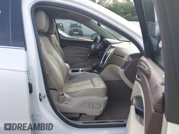 ✅ 2015 Cadillac SRX Performance Collection • VIN: 3GYFNFE34FS547964 • Lot: 43112616. Listed on IAAI with 101,352 mi. Free auction sales archive from the USA and detailed vehicle history report at DreamBid. Image 5.