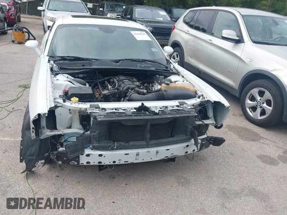 2018 Dodge Challenger R/T z VIN 2C3CDZBT0JH300572, wystawiony jako IAAI lot #43104545 z przebiegiem 83 644 mil mil oraz . Historia ofert i sprzedaży dostępna na DreamBid. Obrazek 12.