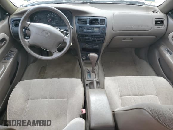 ✅ 1997 Toyota Corolla • VIN: 2T1BA02E7VC180783 • Lot: 80870685. Wystawiony na Copart z przebiegiem 121 627 mil. Bezpłatny archiwum sprzedaży aukcyjnych z USA i szczegółowy raport historii pojazdu na DreamBid. Zdjęcie 8.