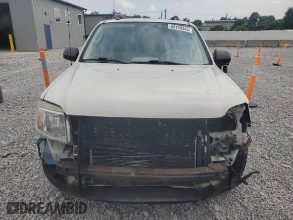 2011 Mercury Mariner z VIN 4M2CN8B71BKJ01749, wystawiony jako Copart lot #64199345 z przebiegiem 157 001 mil mil oraz Szkoda całkowita • Salvage title. Historia ofert i sprzedaży dostępna na DreamBid. Obrazek 5.