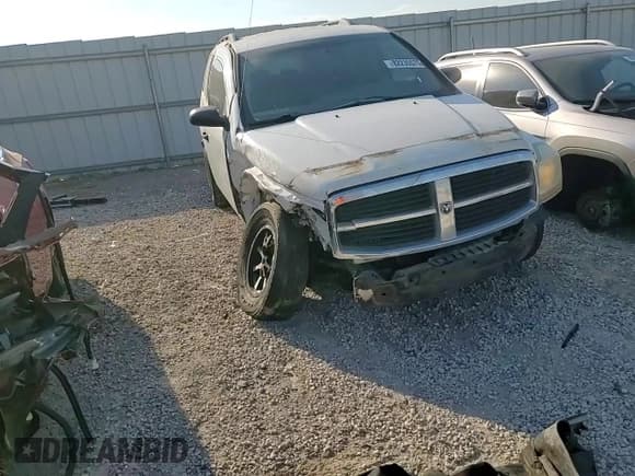 ✅ 2005 Dodge Durango SXT • VIN: 1D4HD38N25F545441 • Лот: 82235575. Опубликован ранее на Copart с пробегом 245 131 миль. Бесплатный доступ к архиву аукционных продаж из США и подробный отчёт об истории автомобиля на DreamBid. Изображение 13.