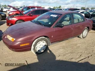 ✅ 2001 Saturn SL • VIN: 1G8ZK52711Z324512 • Лот: 73812924. Опубликован ранее на Copart с пробегом 121 284 миль. Бесплатный доступ к архиву аукционных продаж из США и подробный отчёт об истории автомобиля на DreamBid. Изображение 1.