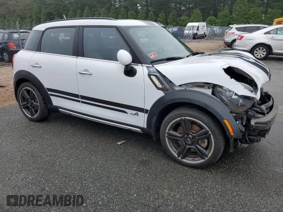 ✅ 2015 MINI Countryman S • VIN: WMWZC5C53FWP48490 • Lot: 81062595. Listed on Copart with 71,414 mi. Free auction sales archive from the USA and detailed vehicle history report at DreamBid. Image 4.