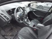 ✅ 2014 Ford Focus Titanium • VIN: 1FADP3N29EL422630 • Lot: 43743369. Listed on IAAI with 96,753 mi. Free auction sales archive from the USA and detailed vehicle history report at DreamBid. Image 14.