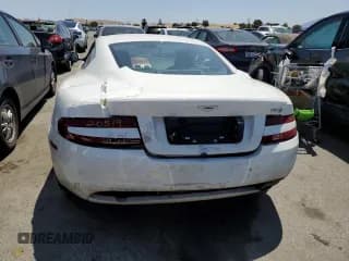 ✅ 2009 Aston Martin DB9 • VIN: SCFAD01E59GA10941 • Lot: 57220313. Wystawiony na Copart z przebiegiem 24 818 mil. Bezpłatny archiwum sprzedaży aukcyjnych z USA i szczegółowy raport historii pojazdu na DreamBid. Zdjęcie 6.