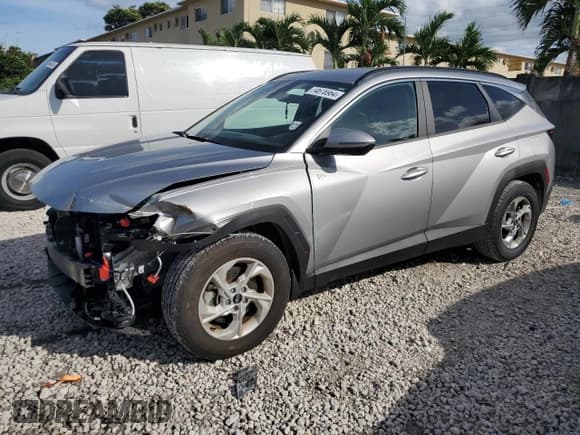 ✅ 2022 Hyundai Tucson SEL • VIN: 5NMJB3AE1NH058863 • Lot: 74676964. Wystawiony na Copart z przebiegiem 27 647 mil. Bezpłatny archiwum sprzedaży aukcyjnych z USA i szczegółowy raport historii pojazdu na DreamBid. Zdjęcie 1.
