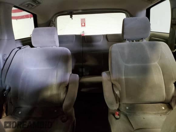 2005 Toyota Sienna LE z VIN 5TDZA23C45S348443, wystawiony jako Copart lot #90807535 z przebiegiem 200 755 mil mil oraz Szkoda całkowita • Salvage title. Historia ofert i sprzedaży dostępna na DreamBid. Obrazek 10.