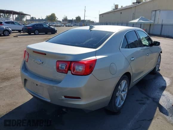 2016 Chevrolet Malibu LTZ z VIN 1G11E5SAXGF105153, wystawiony jako IAAI lot #43159960 z przebiegiem 145 269 mil mil oraz . Historia ofert i sprzedaży dostępna na DreamBid. Obrazek 4.