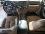 ✅ 2015 Jeep Wrangler Unlimited Altitude • VIN: 1C4HJWEG8FL663283 • Лот: 71833175. Опубликован ранее на Copart с пробегом 117 634 миль. Бесплатный доступ к архиву аукционных продаж из США и подробный отчёт об истории автомобиля на DreamBid. Изображение 8.