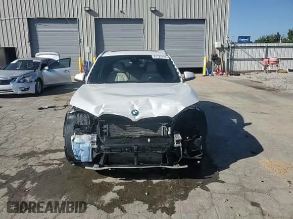 ✅ 2021 BMW X1 xDrive28i • VIN: WBXJG9C00M5T75687 • Лот: 81722915. Опубликован ранее на Copart с пробегом 59 467 миль. Бесплатный доступ к архиву аукционных продаж из США и подробный отчёт об истории автомобиля на DreamBid. Изображение 14.