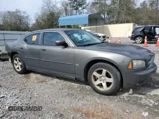 2010 Dodge Charger SXT с VIN 2B3CA3CV7AH155999, выставлен на аукционе Copart как лот 44374794 с пробегом 209 999 миль миль и Списание • Salvage title. История ставок и продаж доступна на DreamBid. Изображение 4.