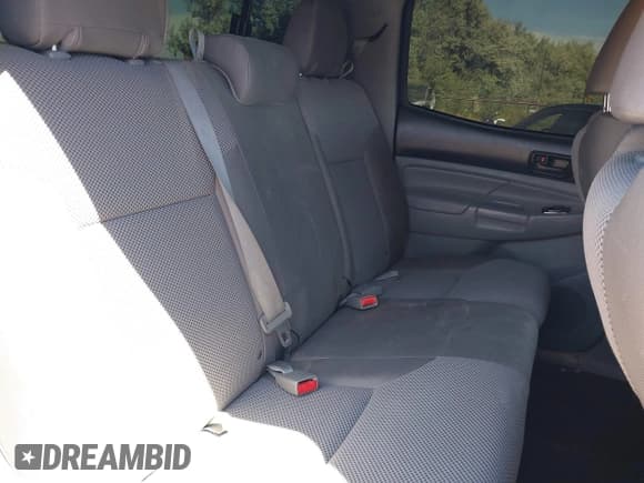 ✅ 2012 Toyota Tacoma PreRunner • VIN: 3TMJU4GN8CM136850 • Lot: 42767423. Listed on IAAI with 128,151 mi. Free auction sales archive from the USA and detailed vehicle history report at DreamBid. Image 8.