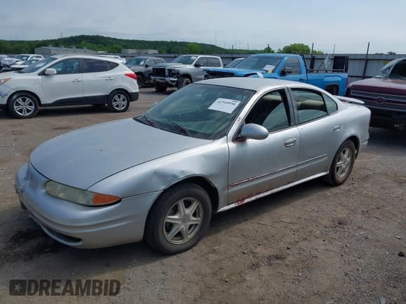 ✅ 2002 Oldsmobile Alero GL1 • VIN: 1G3NL52F32C213795 • Lot: 42310950. Wystawiony na IAAI z przebiegiem Nie podano. Bezpłatny archiwum sprzedaży aukcyjnych z USA i szczegółowy raport historii pojazdu na DreamBid. Zdjęcie 2.