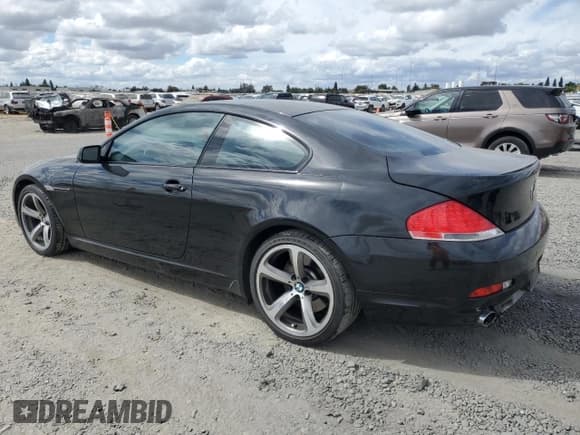 ✅ 2007 BMW 6 Series 650i • VIN: WBAEH13517CR52037 • Лот: 80124315. Опубликован ранее на Copart с пробегом 104 702 миль. Бесплатный доступ к архиву аукционных продаж из США и подробный отчёт об истории автомобиля на DreamBid. Изображение 2.