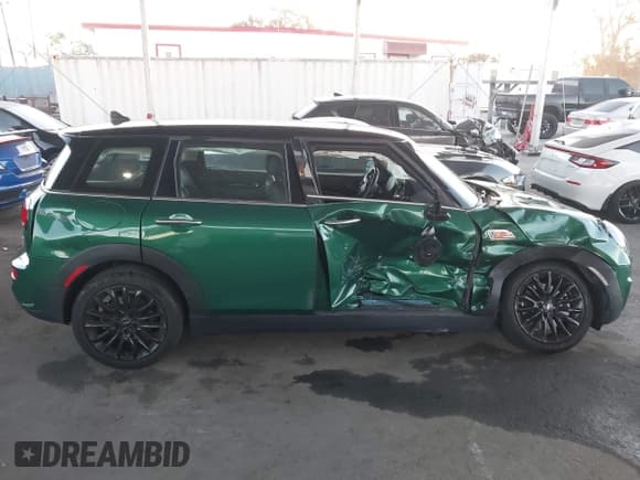 ✅ 2023 MINI Clubman Cooper S • VIN: WMWLV7C01P2T81923 • Lot: 43553279. Listed on IAAI with 26,048 mi. Free auction sales archive from the USA and detailed vehicle history report at DreamBid. Image 13.