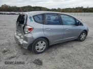 ✅ 2009 Honda Fit • VIN: JHMGE88249C006849 • Lot: 82606745. Listed on Copart with 144,380 mi. Free auction sales archive from the USA and detailed vehicle history report at DreamBid. Image 3.
