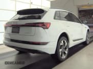 ✅ 2021 Audi e-tron Premium • VIN: WA1AAAGE8MB010286 • Lot: 91050295. Listed on Copart with 96,490 mi. Free auction sales archive from the USA and detailed vehicle history report at DreamBid. Image 4.