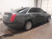 ✅ 2014 Cadillac CTS Luxury AWD • VIN: 1G6AX5S37E0172041 • Лот: 40343343. Опубликован ранее на IAAI с пробегом 102 506 миль. Бесплатный доступ к архиву аукционных продаж из США и подробный отчёт об истории автомобиля на DreamBid. Изображение 4.